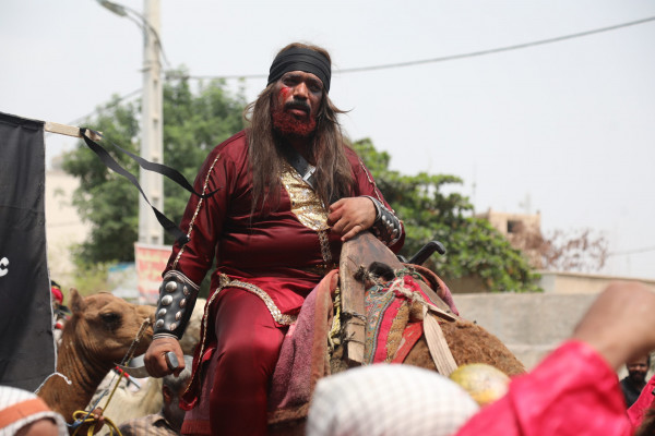 «شیر و کُتل» رسم ۴۰۰ ساله مینابی‌ها در روز عاشورا