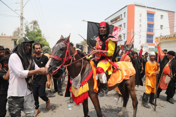 «شیر و کُتل» رسم ۴۰۰ ساله مینابی‌ها در روز عاشورا